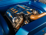 14 Close up of highly detailed engine bay in 1969 Ford F 100 featuring blue and copper highlights