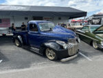 15 Classic 1941 Chevrolet pickup in metallic blue and black featuring a lowered stance and gold wheels