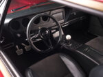 17 1966 Pontiac GTO driver’s seat view red stitched leather shifter pedals clean retro mod interior