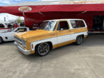 17 Custom two tone 1973 91 Chevrolet Blazer with lowered stance and modern wheels showcased at the event