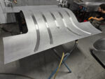 19 Fully assembled metal bed floor with raised channels and wheel tubs in Chevy OBS truck