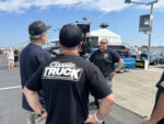 21 Classic Truck Performance crew films a segment at the show capturing the action among custom trucks and enthusiasts