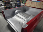 24 Fully fabricated Chevy OBS truck bed interior with reinforced ribs and smooth metal finish