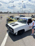 24 Square body Chevrolet C10 with BFGoodrich Share the Ride branding showcasing vented hood and black wheels