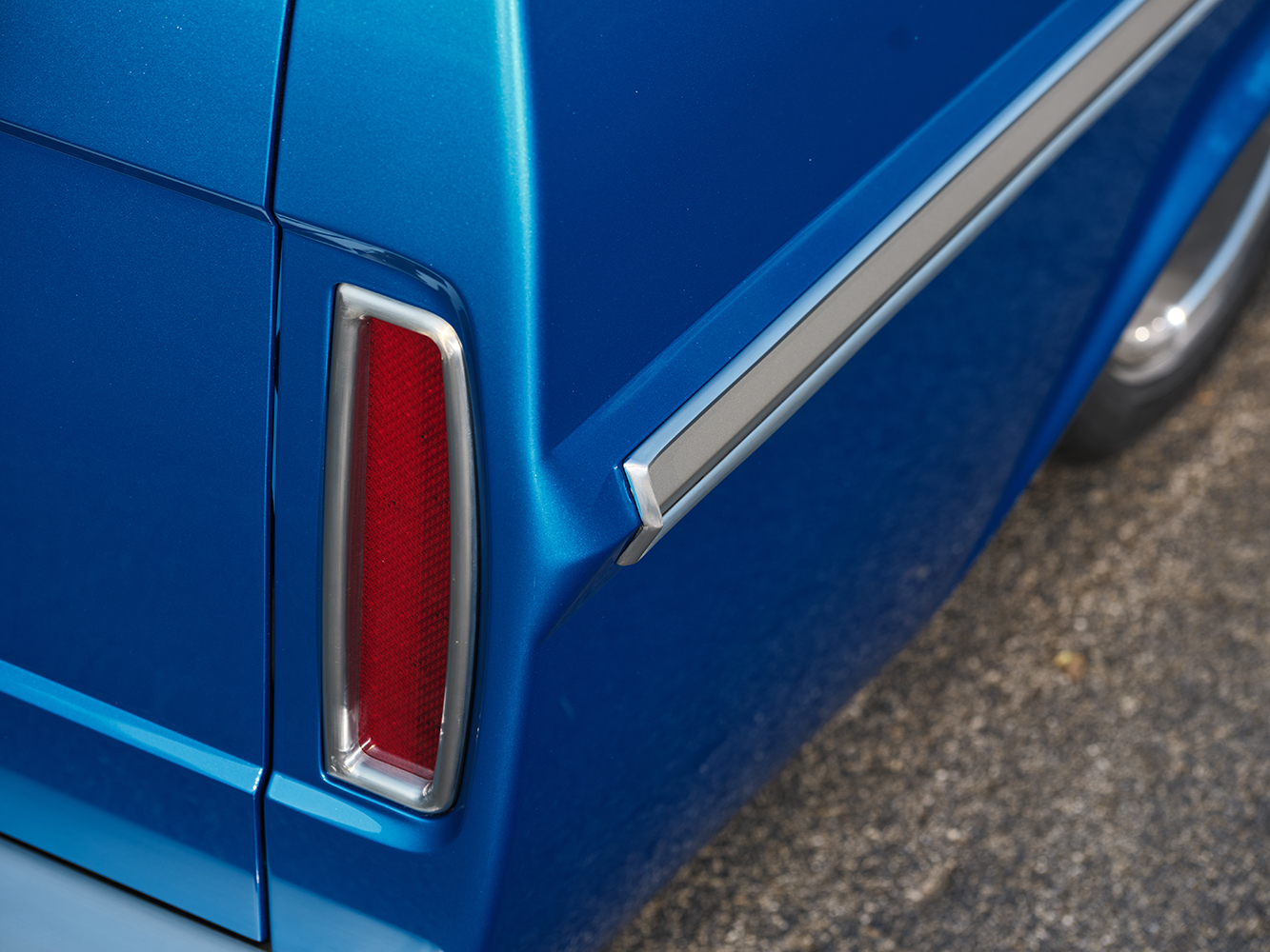 25 Classic tail light with sleek chrome trim on a 1969 Ford F100
