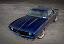 001 1969 Camaro custom pro touring build with deep blue metallic paint split spoke wheels and redline tires