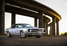 001 1969 Chevy Camaro features a silver metallic body with polished five spoke wheels and a lowered stance