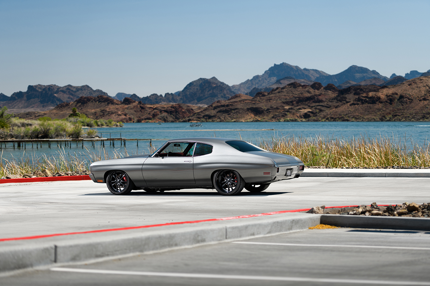 003 1970 Chevy Chevelle rear profile with custom dual exhausts and iconic flowing lines