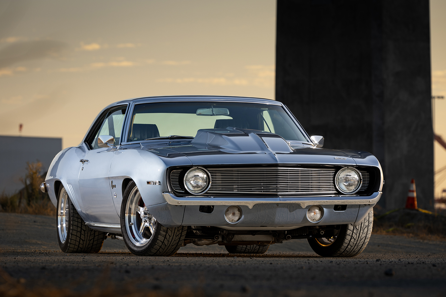 004 1969 Chevy Camaro’s side profile flaunts sleek body lines and integrated side vents for a timeless muscle car look