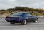 005 1969 Camaro front end with blacked out grille dual halo headlights and an aerodynamic front splitter