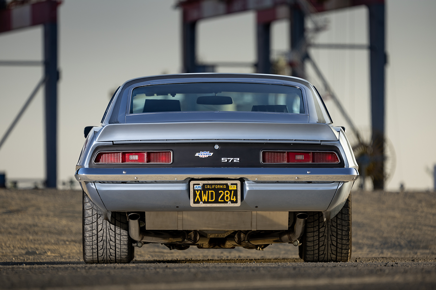 008 1969 Chevy Camaro’s rear diffuser and chrome bumper detail reflect its blend of classic and modern design elements