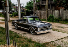 01 1969 Chevy C10 custom lowered pickup truck with black paint and chrome accents
