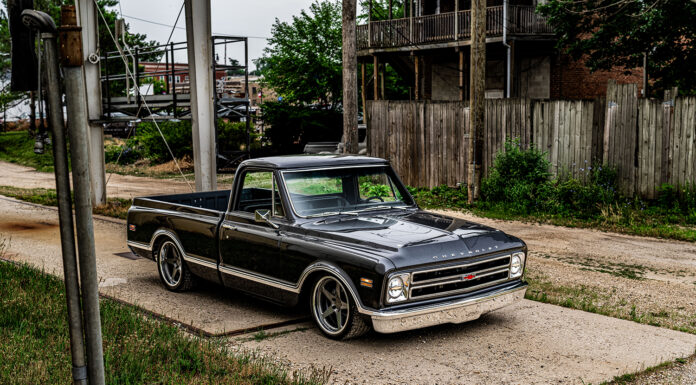 01 1969 Chevy C10 custom lowered pickup truck with black paint and chrome accents