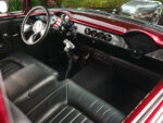 010 1955 Chevrolet Bel Air front angle chrome grille massive supercharger and bold hot rod muscle car style