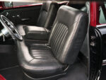 011 1955 Chevy Bel Air black leather seats with red stitching blending vintage style and modern comfort interior design