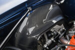 011 1969 Chevrolet Camaro engine bay featuring carbon fiber inner fenders for lightweight strength and a modernized appearance