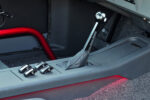 013 1967 Chevy Nova custom shifter setup with sleek design and polished levers adds functionality to the center console