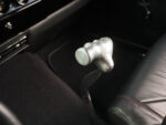 015 1955 Chevy Bel Air billet shifter handle with a polished ergonomic design for a sleek interior upgrade