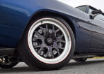 018 1969 Chevrolet Camaro side profile showcasing polished Weld Racing wheels and Nitto performance tires for street dominance