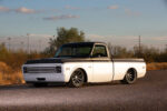 02 Side profile of a 1969 Chevrolet C10 showcasing lowered suspension and matte black trim details