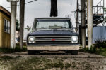 03 1969 Chevy C10 front grille with classic Chevrolet emblem and chrome trim