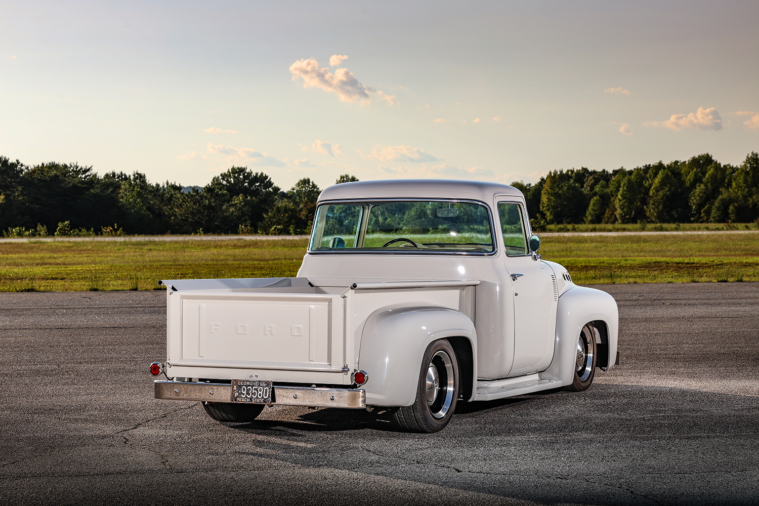 04 1956 Ford F 100 rear view with embossed FORD tailgate chrome bumper and vintage license plate