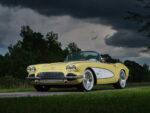 05 1961 Corvette convertible yellow parked country road lush greenery background