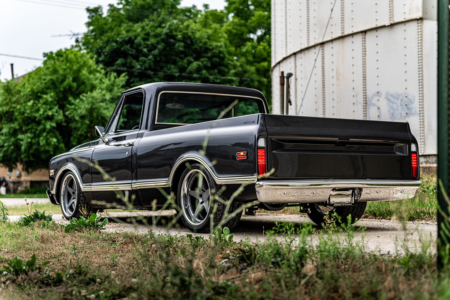 05 1969 Chevy C10 rear view with custom taillights and smooth bed cover