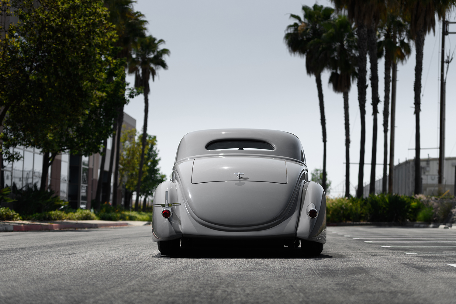 06 1936 Ford custom rear profile smooth trunk integrated taillights streamlined fender design gray finish