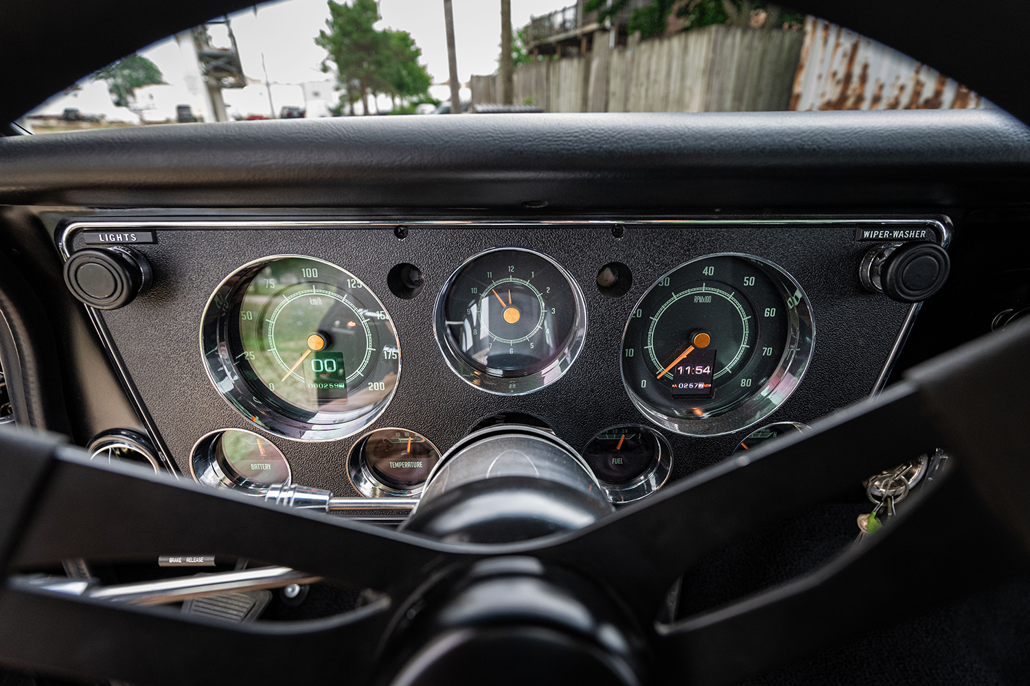 07 1969 Chevy C10 dashboard close up showcasing vintage inspired instrument cluster and detailing
