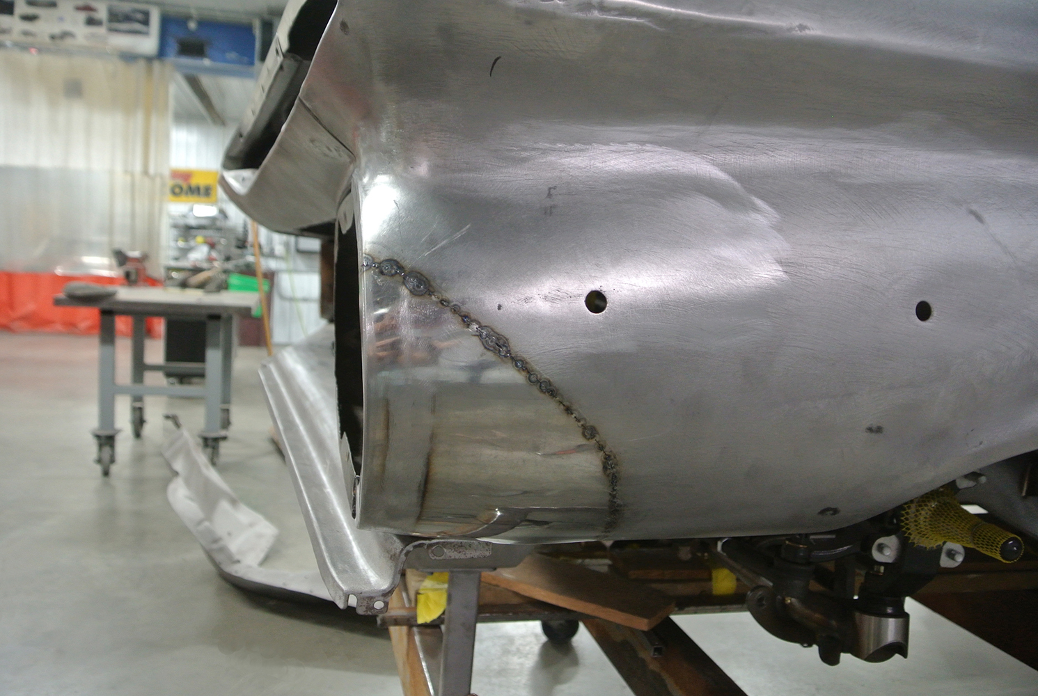 08 Welded lower rear quarter panel repair on a 1959 Impala reinforcing structural integrity