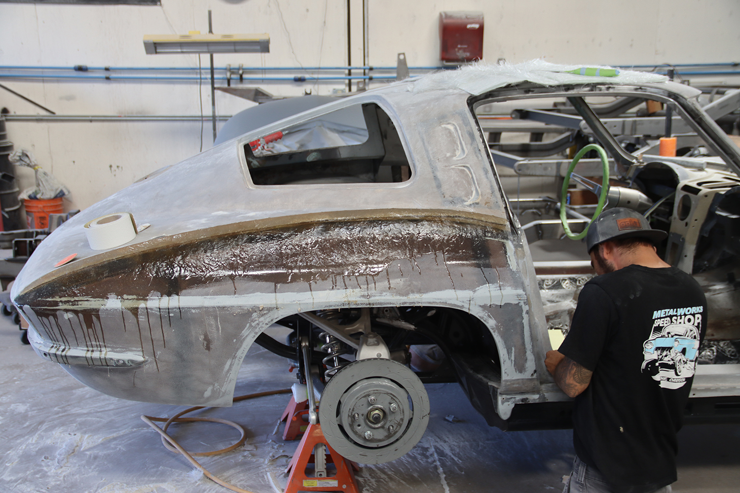 09 Side view of the C2 Corvette with extensive fiberglass work on the rear quarter panel and wheel arch