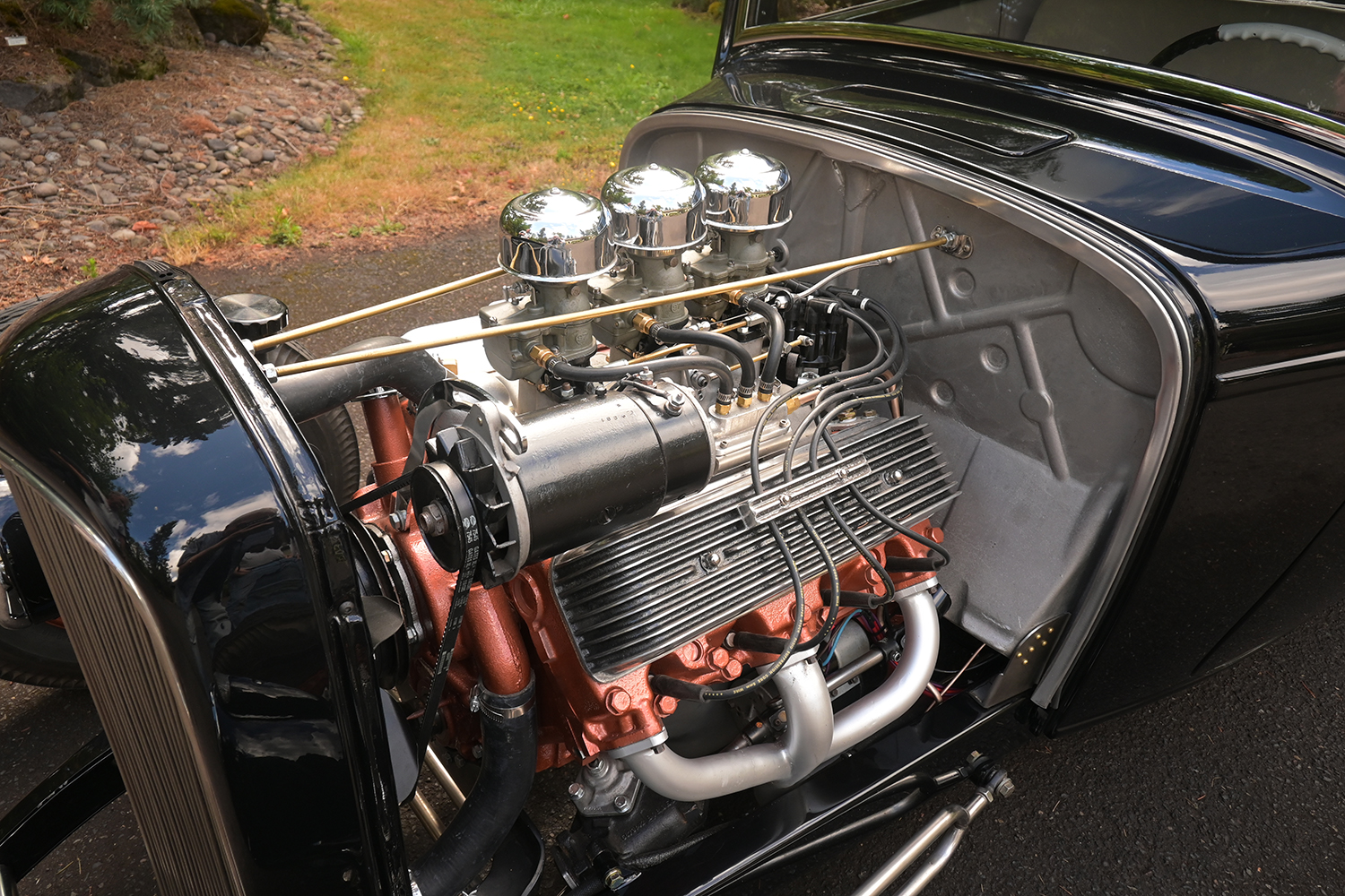 11 1932 Ford Coupe flathead V8 with triple Stromberg carburetors polished air cleaners detailed fuel and ignition system