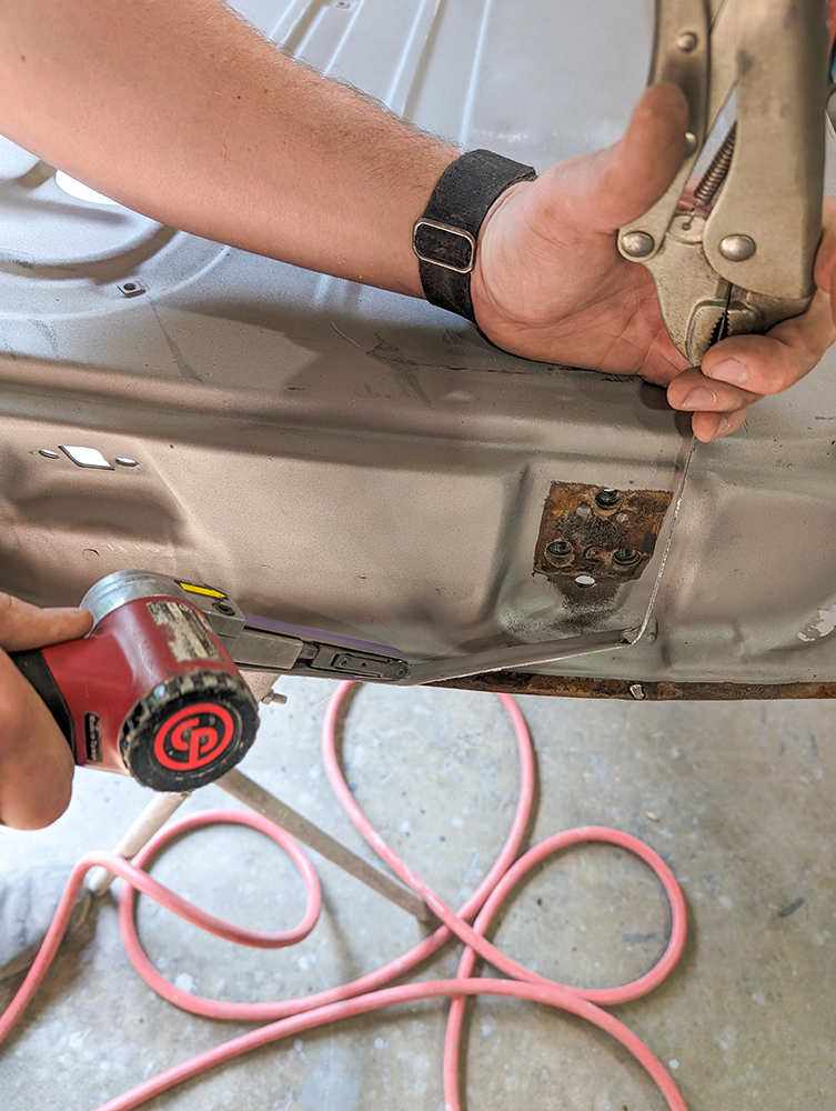 14 Pneumatic tool trimming 1966 Chevy truck door panel with vise grip holding alignment