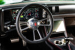 15 1985 Chevy Monte Carlo black quilted interior red stitching digital dashboard custom upholstery