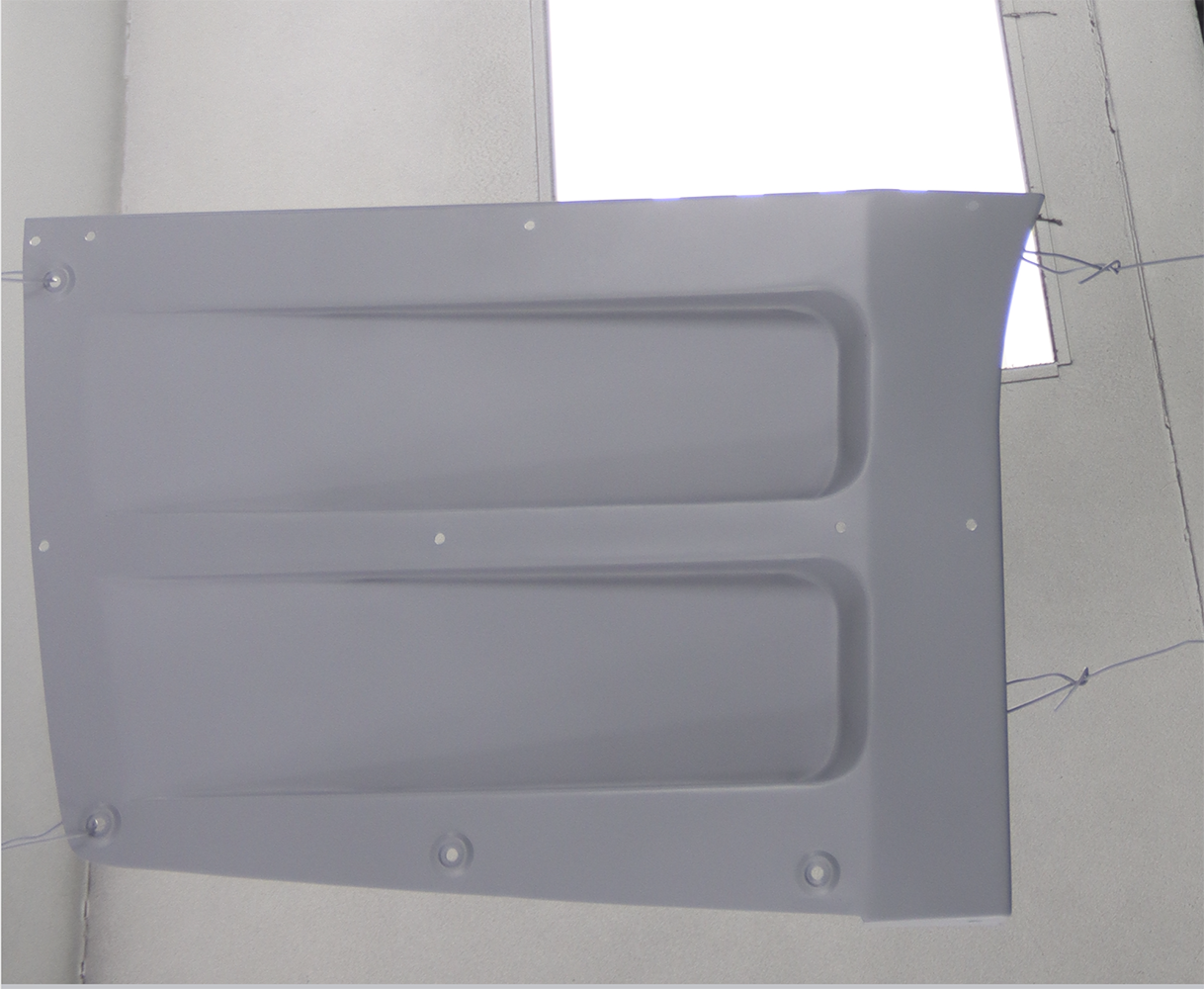 15 Primed C2 Corvette hood undergoing prep work with smooth fiberglass finish for final painting