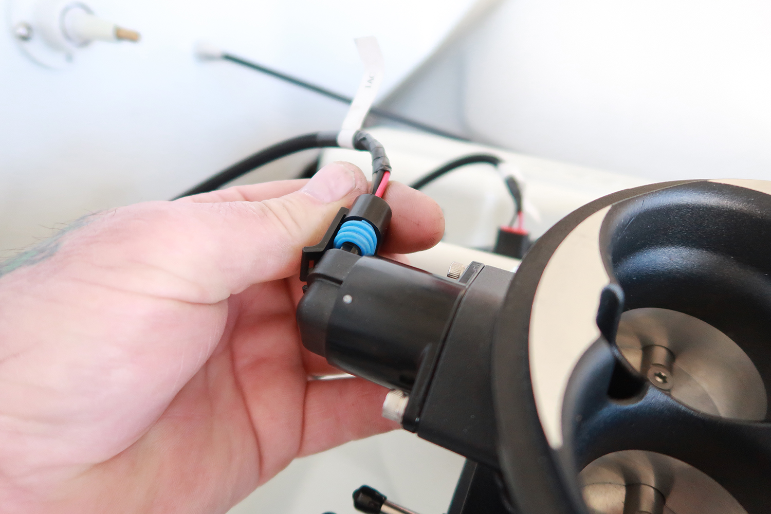 16 Injector wiring harness being connected to the FiTech system for seamless fuel delivery