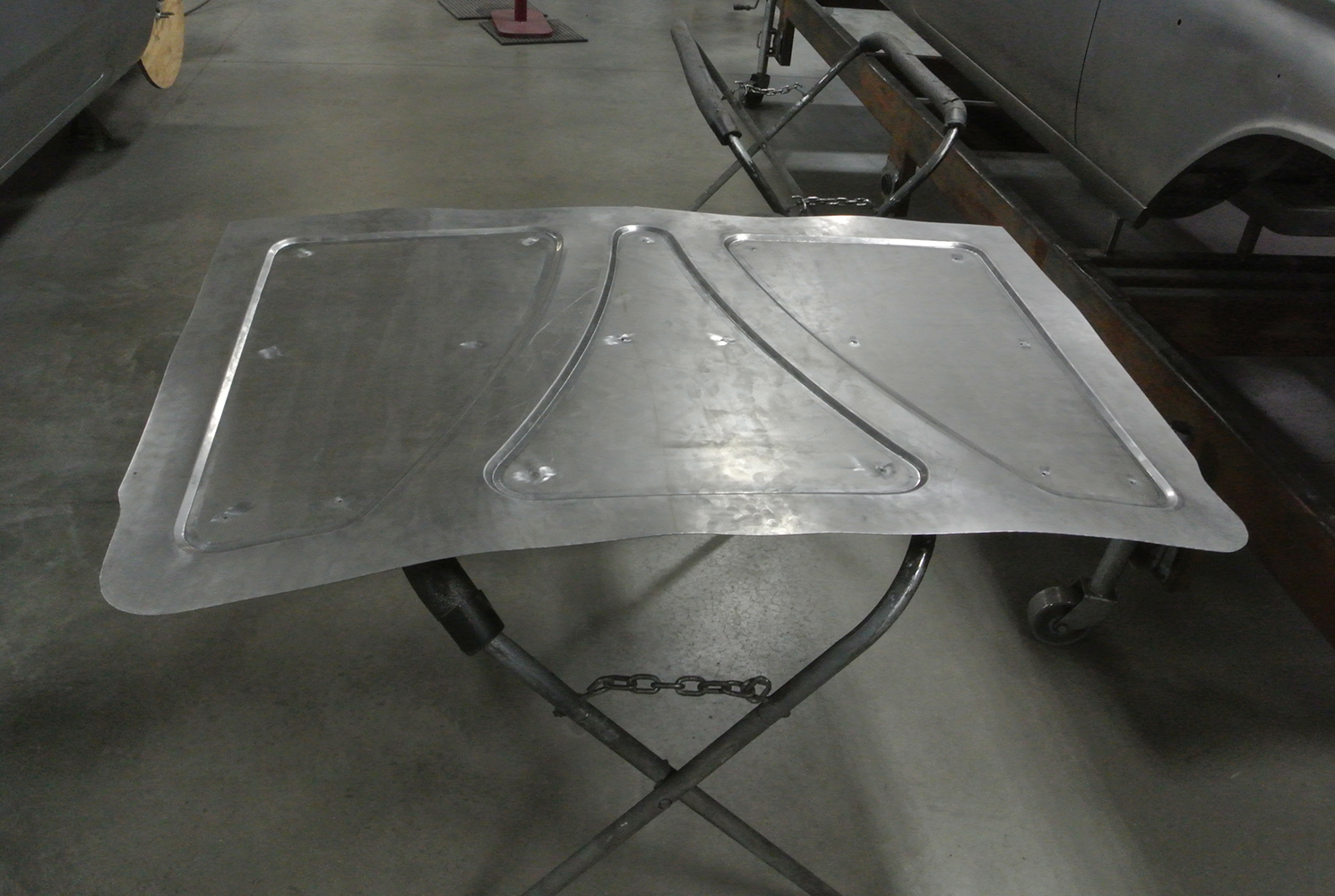 18 Custom trunk panel in raw metal for a 1959 Chevy Impala displaying reinforcement channels