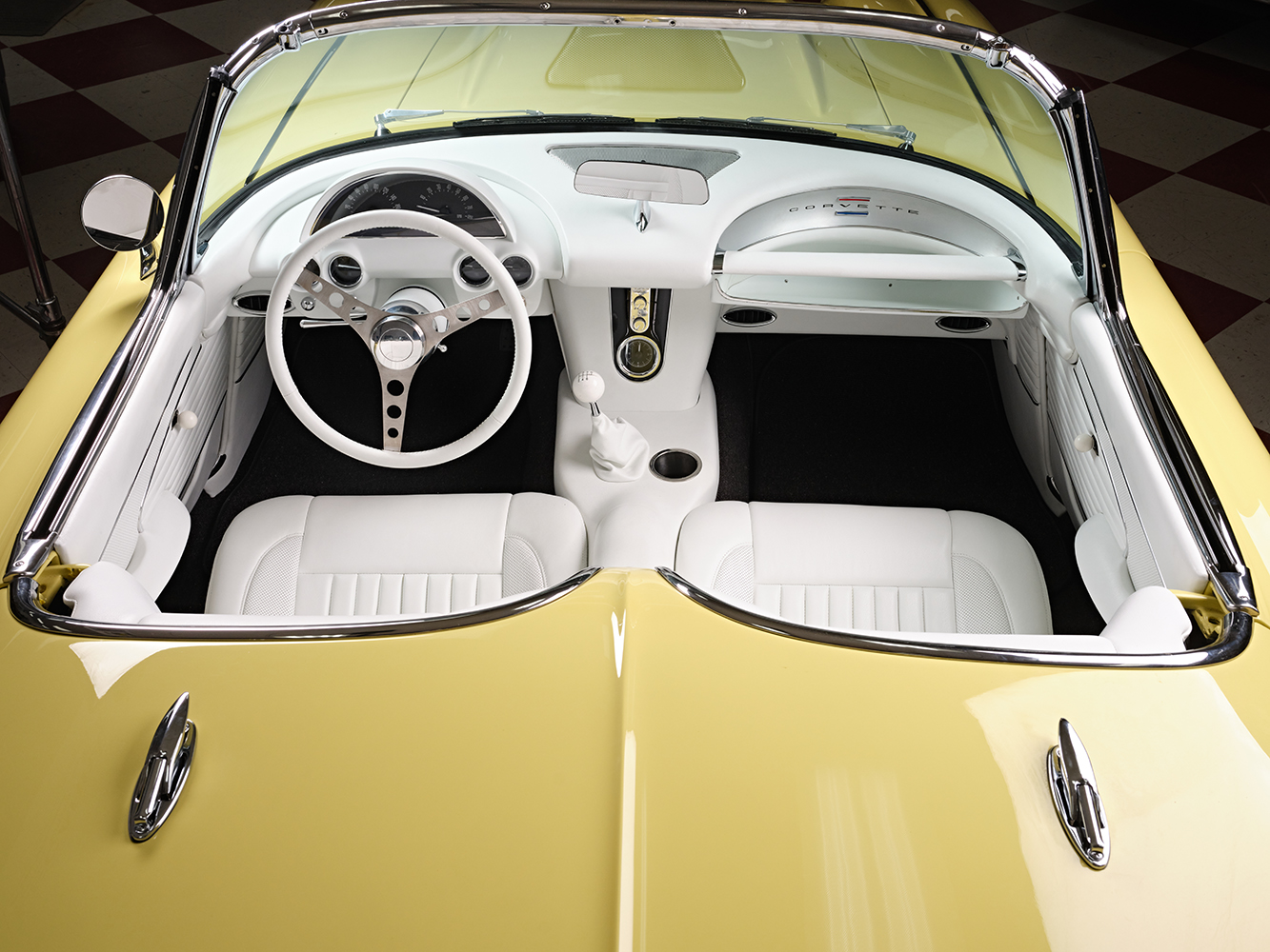 19 Interior view 1961 Corvette yellow white upholstery classic dashboard design