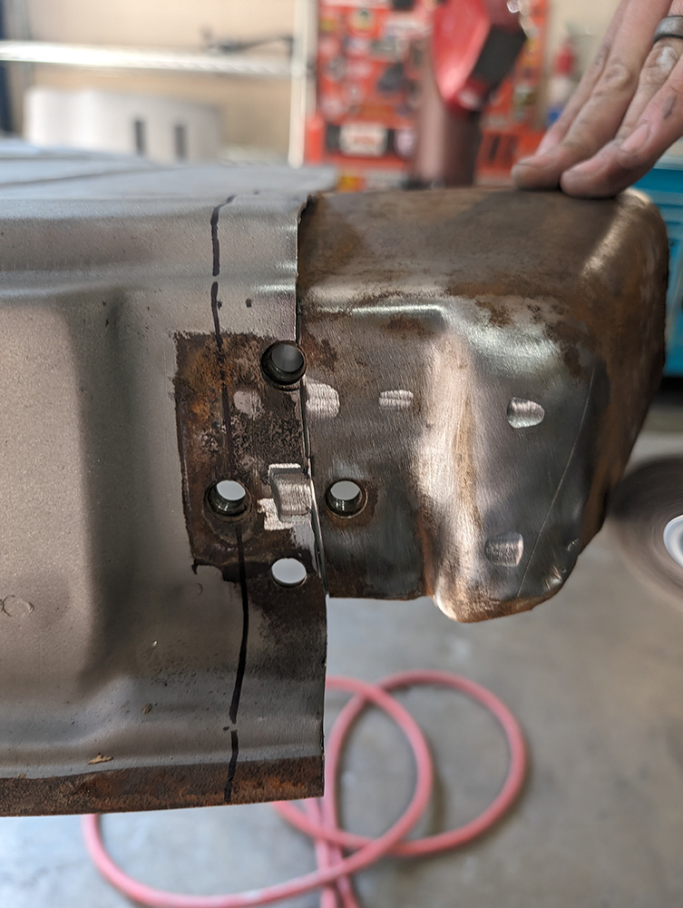 20 Rusted 1966 Chevy truck door corner repair showing replacement panel alignment