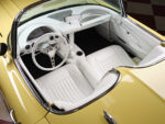 21 1961 Corvette yellow interior white upholstery chrome steering wheel retro modern design