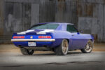 006 1969 Chevy Camaro rear angle blue paint white stripes and modern performance wheels