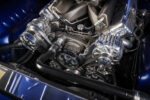 008 1969 Chevy Camaro close up of serpentine belt system with polished pulleys and chrome accents