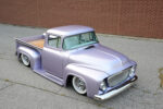 01 1956 Ford F100 with a sleek lavender finish and a custom front grille design