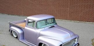 01 1956 Ford F100 with a sleek lavender finish and a custom front grille design