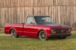 01 1967 Chevy C10 in red and matte gray with custom wheels and lowered suspension for a modernized classic look 1
