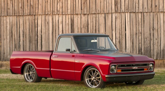 01 1967 Chevy C10 in red and matte gray with custom wheels and lowered suspension for a modernized classic look 1