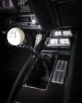 012 1969 Chevy Camaro center console with manual shifter and retro gauges
