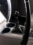 014 1966 Chevy Chevelle manual transmission shifter with black knob and leather boot