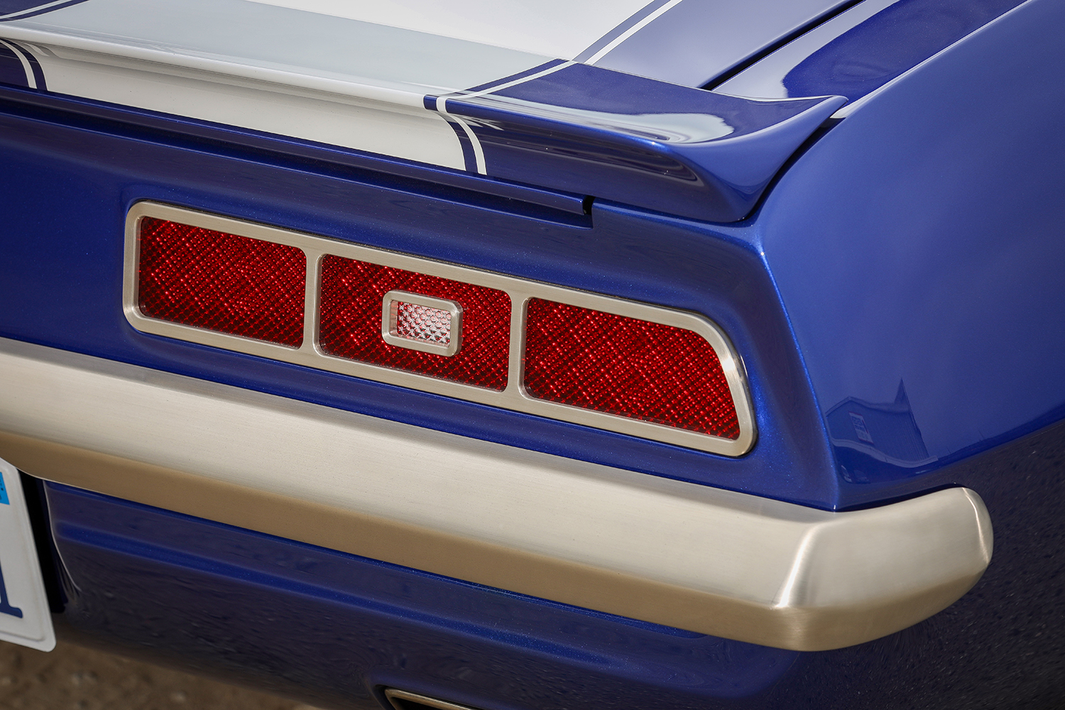 015 1969 Chevy Camaro rear taillight detail with red lenses and white racing stripes